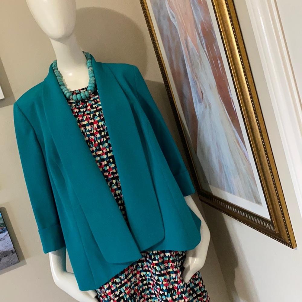 A beautiful turquoise swing jacket by Kasper!